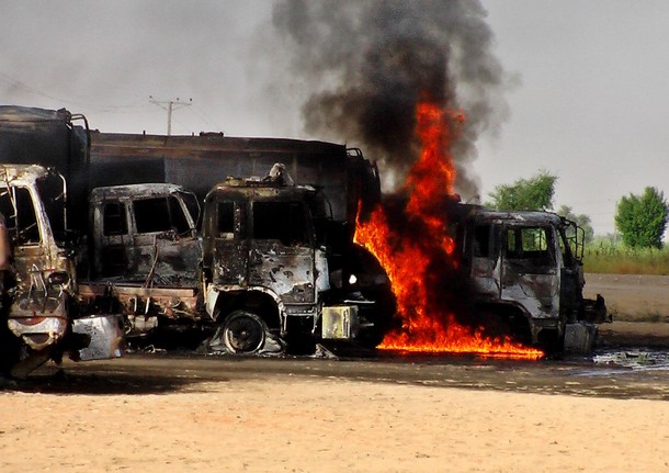 Six vehicles torched in Kurram, 10 kidnapped