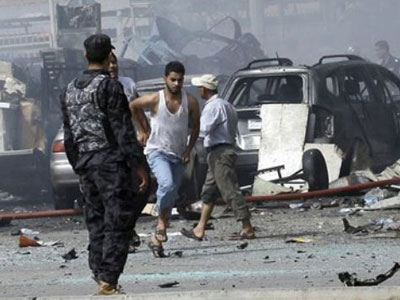 iraq blast fourtenn killed