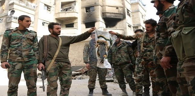 Eastern Ghouta: Terrorists Hand over Modern Arms Made in Israeli, Europe to Syrian Army