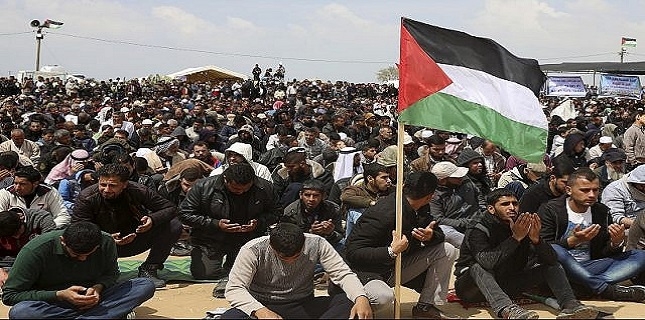 Gazans hold new mass protest; Israel drops leaflets to warn people