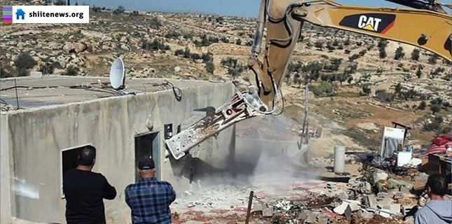 Israeli occupation authorities Demolishes Home of Palestinian Martyr in Khalil