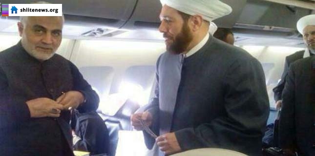 Photo: Top Iranian mysterious commander in plane with senior Syrian Sunni Mufti
