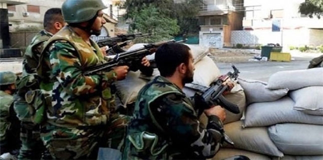 Syria army continues battle against Takfiris north of Mleiha