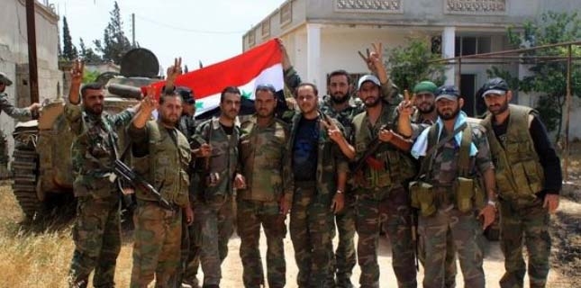 Syria troops recapture town near Damascus