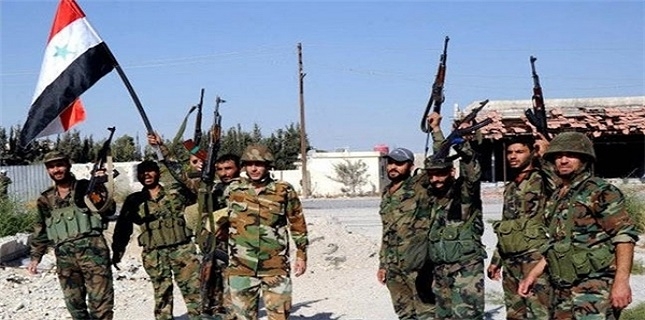 Syrian forces take control of key town near Damascus