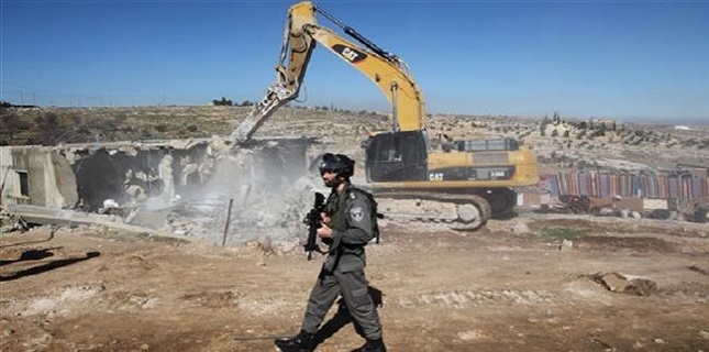 Israeli forces demolish Palestinian building in East Jerusalem al-Quds