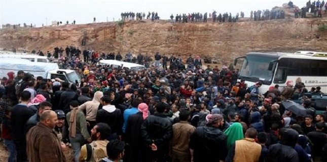 Militants leaving last strongholds in Syria’s Homs, Hama