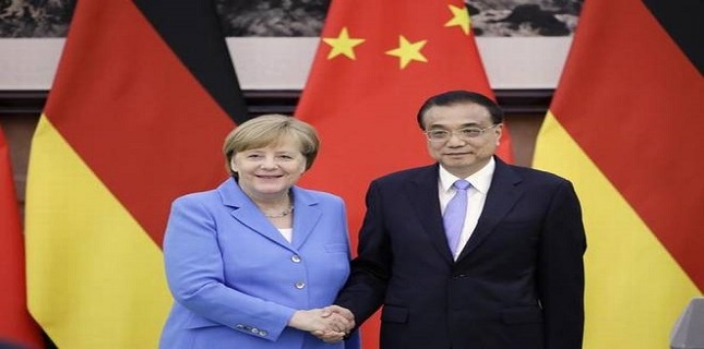 In Beijing, Merkel says Germany, China stand by Iran deal