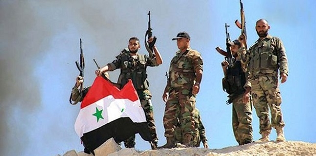 Militants hand over heavy weapons in southwestern Syria: Report