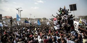 Sudanese rally on streets in protest as death toll mounts