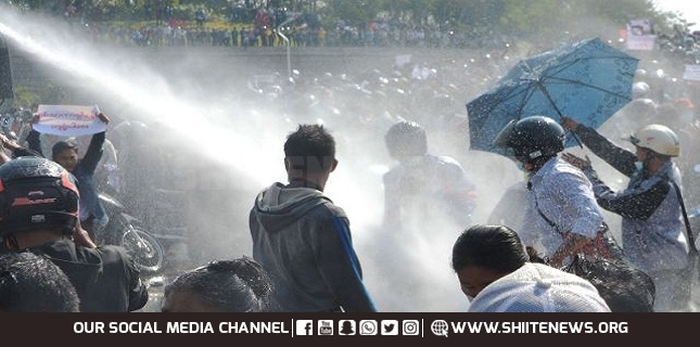 Fears of military crackdown as Myanmar police use water cannon against anti-coup protesters