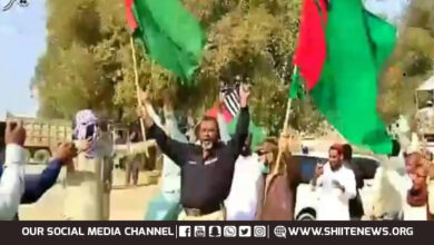 Police official raises outlawed terrorist outfit flag in their Karachi rally