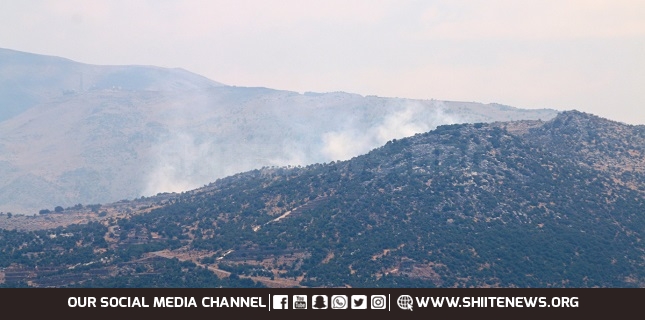 Hezbollah launches rocket fire in response to Israeli air raids