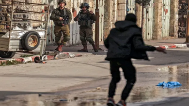 Two Israeli troops injured in retaliation after Palestinian shot dead