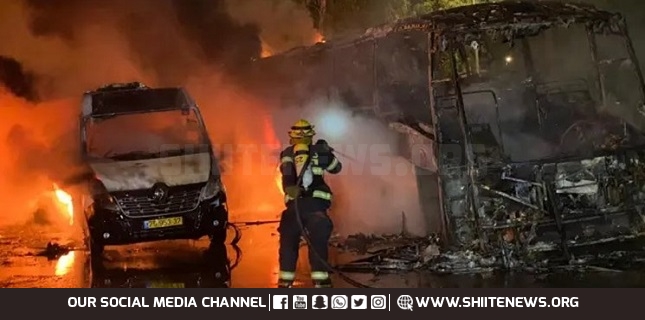 Two buses torched at parking lot in Israeli-occupied territories south of Tel Aviv