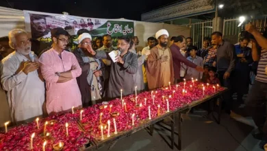 Prayer, lighting in memory of Shaheed Naveed Ashiq and students martyred in Afghanistan
