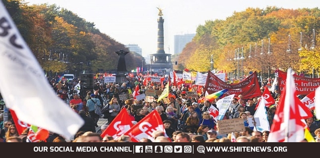German demonstrators hold massive rally in Berlin in protest at hiking prices