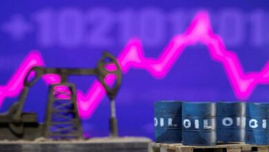 Oil prices edge higher on easing COVID curbs in China, firm dollar limits gains