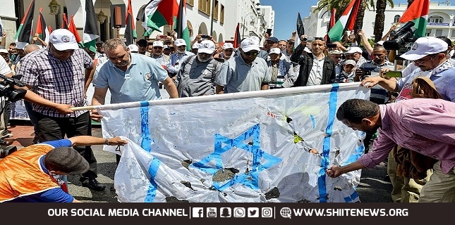 Moroccans burn Israeli flag to reject ties normalization