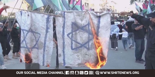 Hundreds of people in Syrian refugee camp express solidarity with Gaza