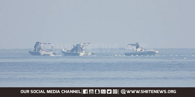 China stages naval drills near disputed South China Sea reef
