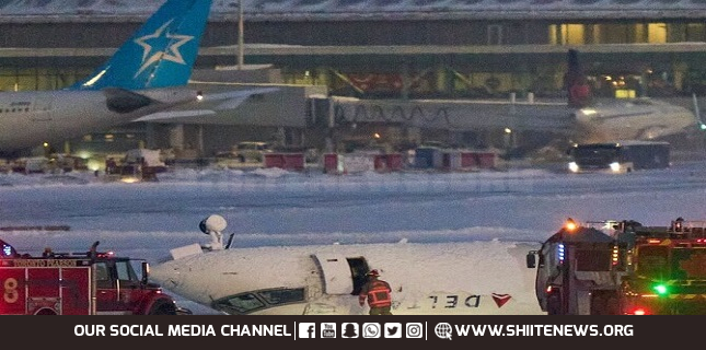 Delta plane flips upside down on landing at Toronto airport, injuring 18