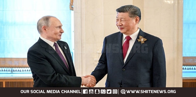 Xi tells Putin China glad to see improved US-Russia relations