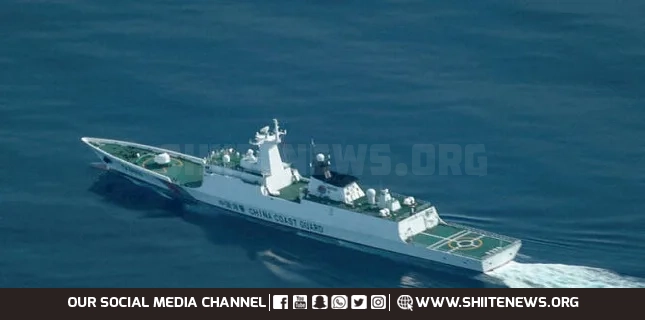 China holds National Day ceremony in waters off atoll claimed by China Philippines
