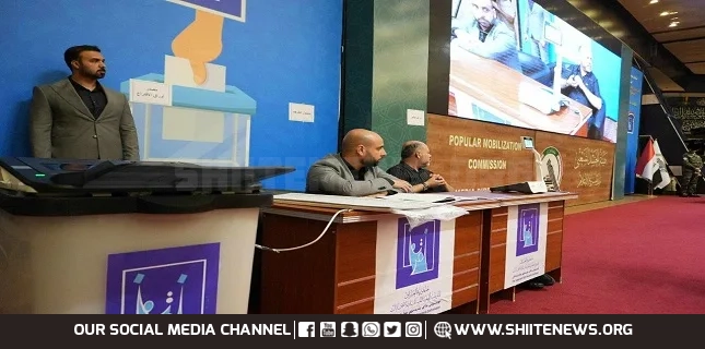 The Popular Mobilization Forces participate in a simulation of the special voting poll for the parliamentary elections