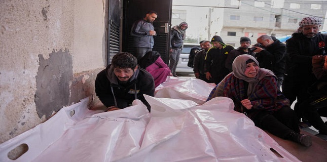 Israeli fire kills 11 Palestinians in Gaza, including two children, local hospital officials say