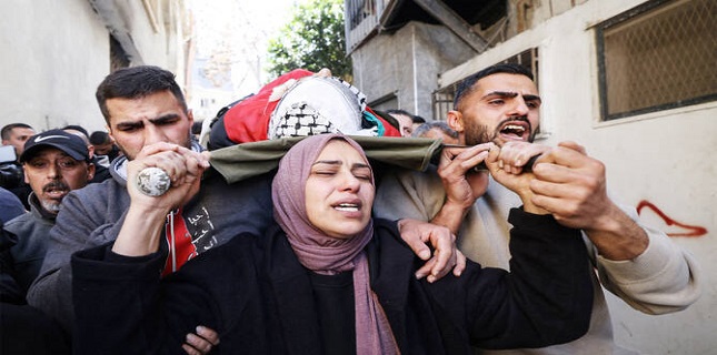 West Bank Palestinians bury teenager shot dead by Israeli forces