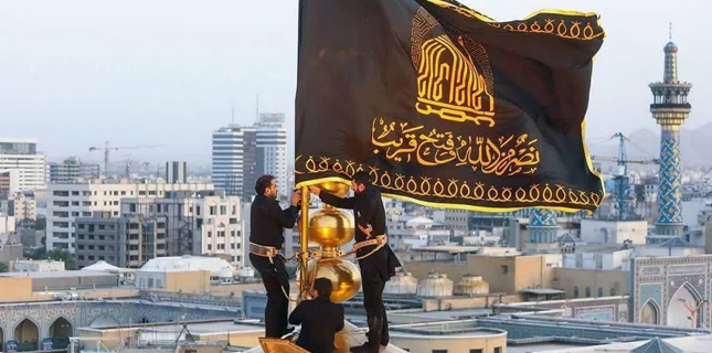Imam Raza (A.S.) Shrine in Mashhad Hoists Black Flag in Mourning